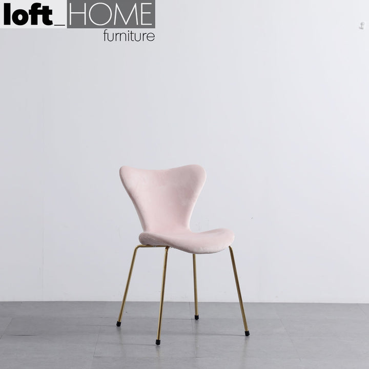Scandinavian velvet dining chair ant material variants.