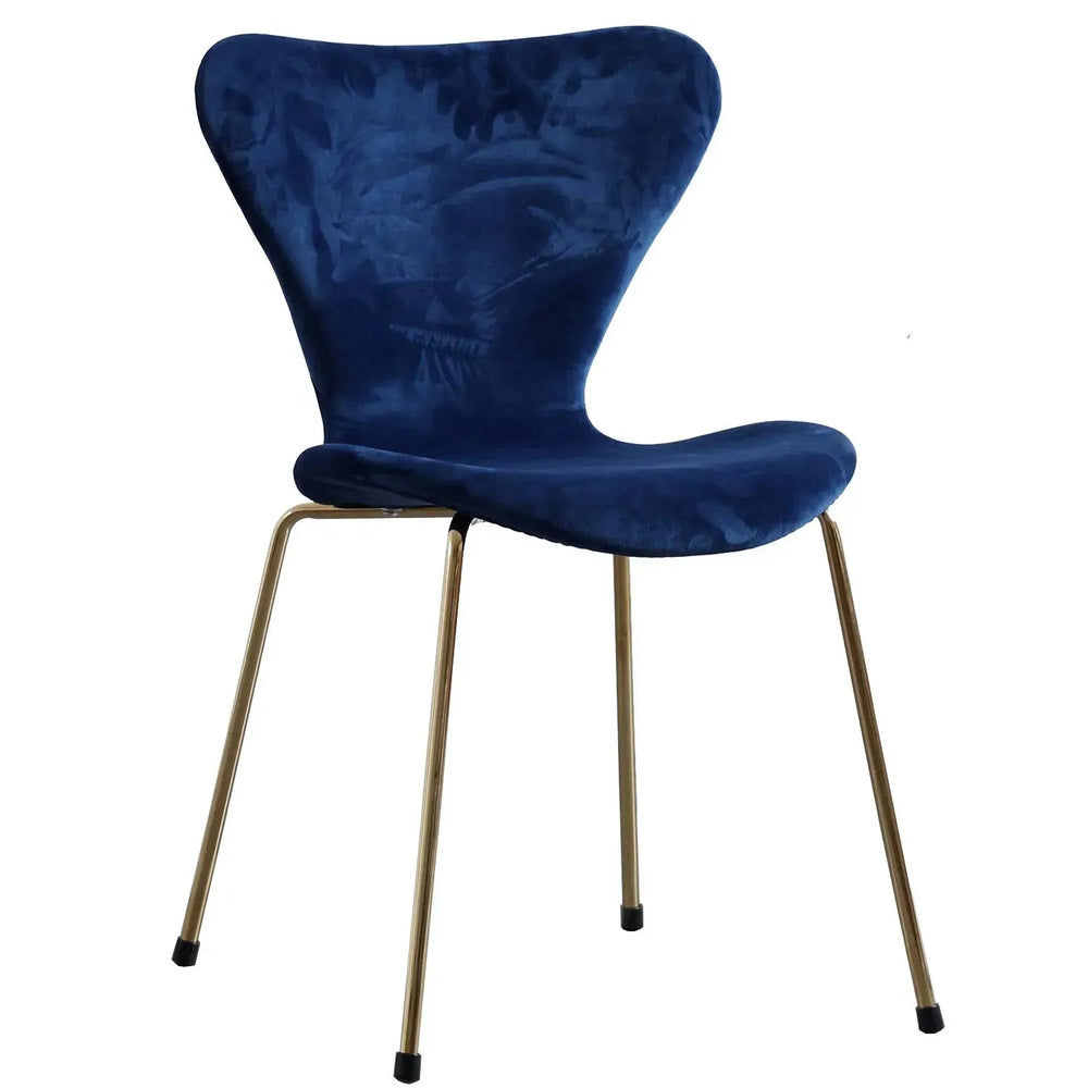 Modern velvet dining chair ant in white background.