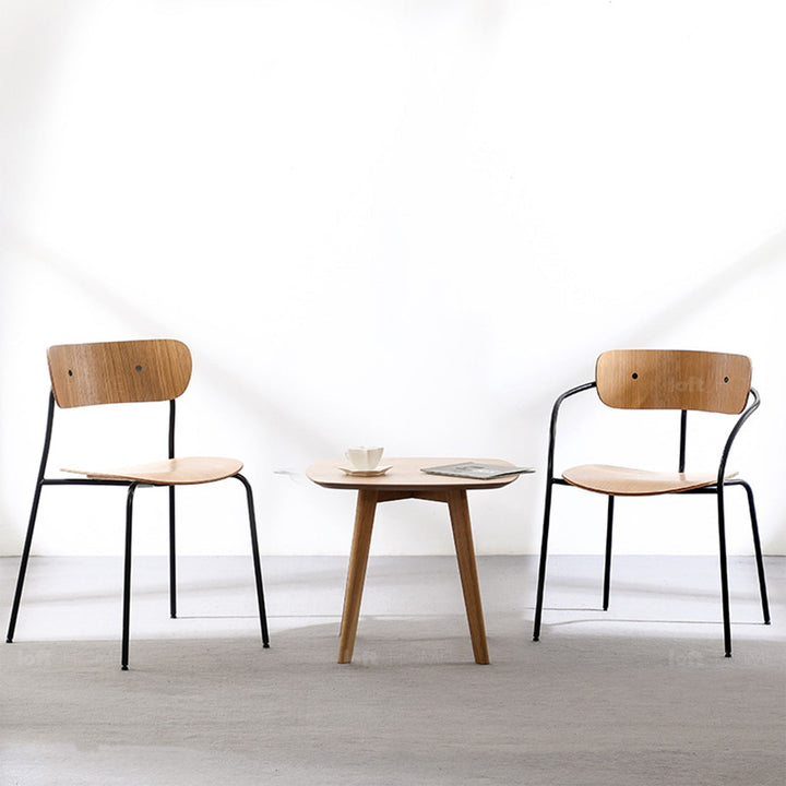Scandinavian wood armrest dining chair pavilion av2 with context.
