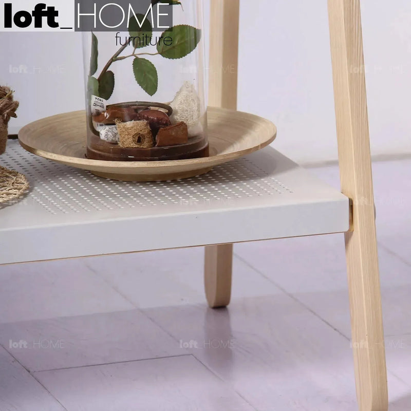 Modern wood cloth hanger toj with context.