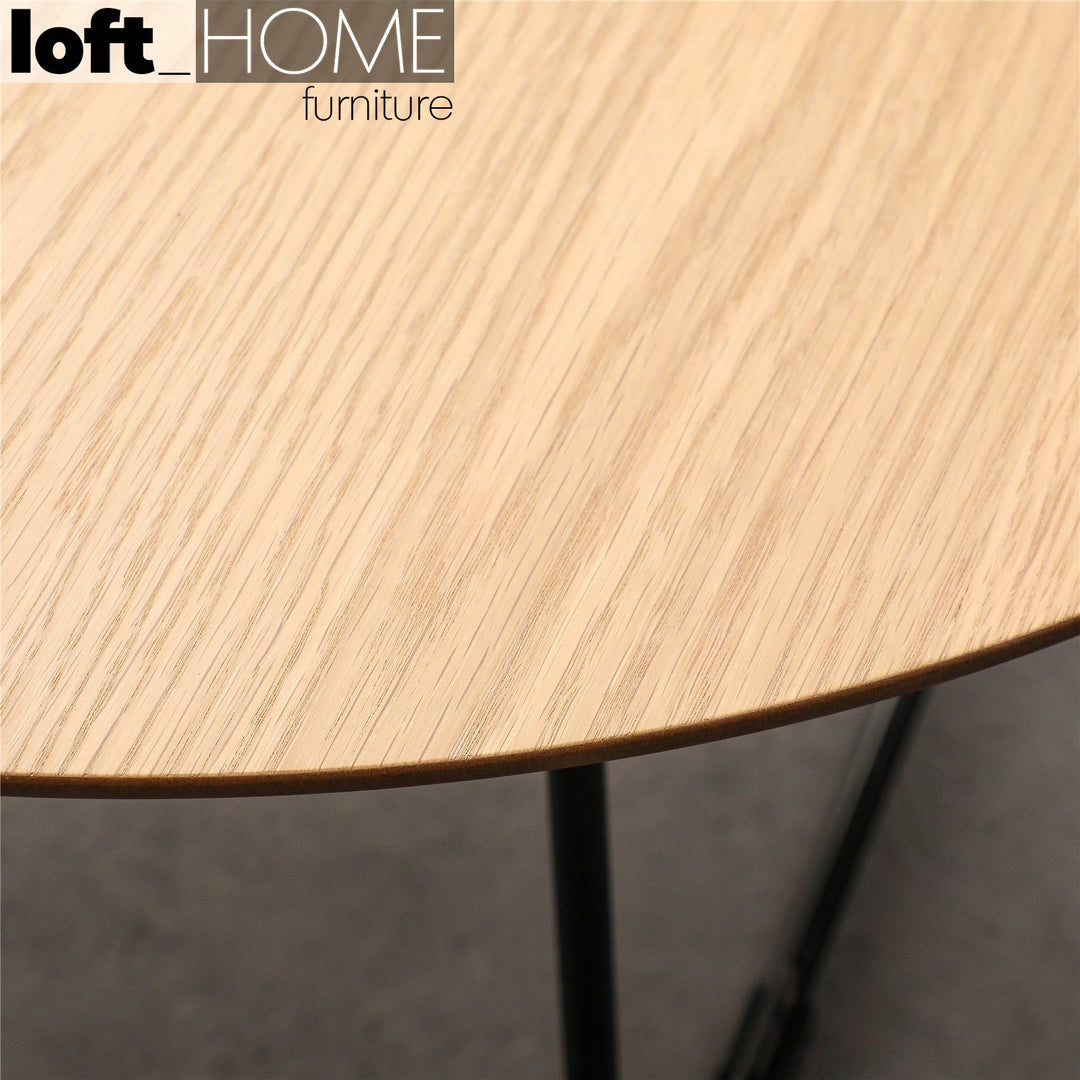 Scandinavian wood coffee table carlos round in close up details.