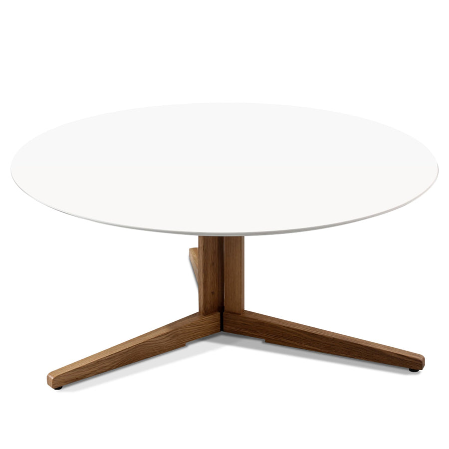 Scandinavian wood coffee table nick in white background.