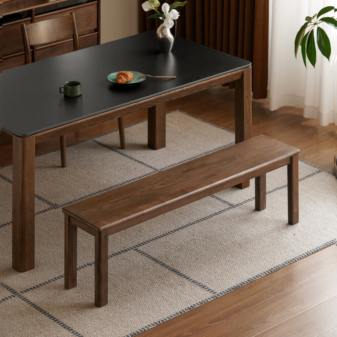 Scandinavian wood dining bench axel in close up details.