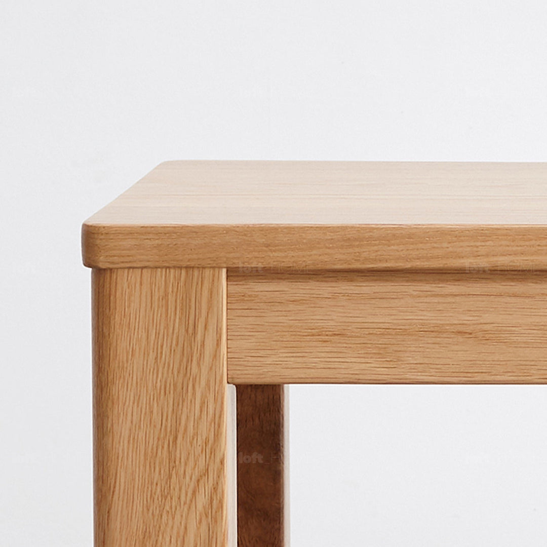 Scandinavian wood dining bench rotter in details.