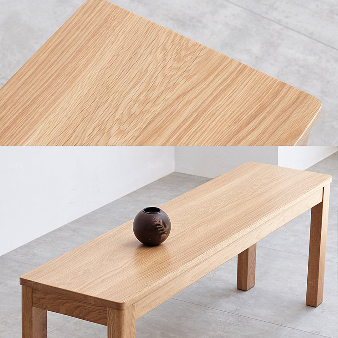 Scandinavian wood dining bench rotter with context.