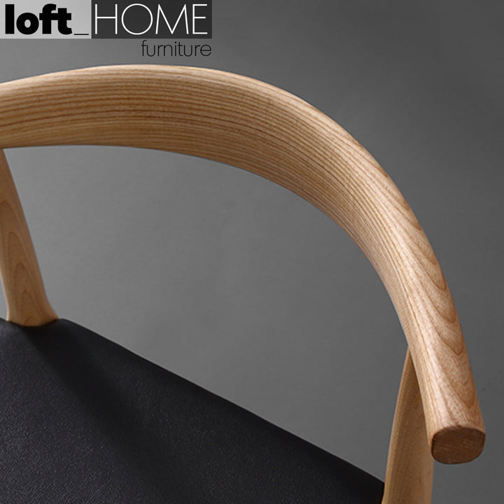 Scandinavian wood dining chair birch elbow with context.