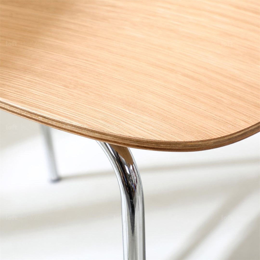 Scandinavian wood dining chair co in details.