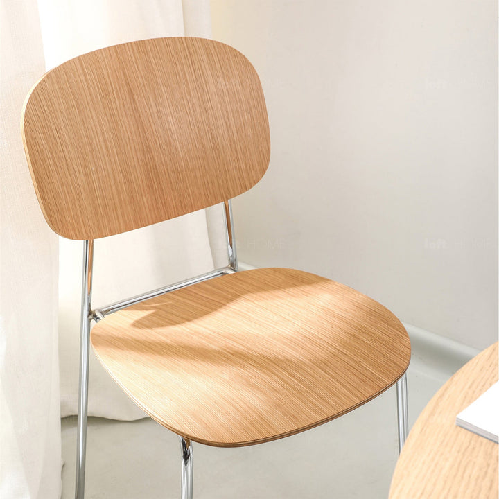 Scandinavian wood dining chair co material variants.