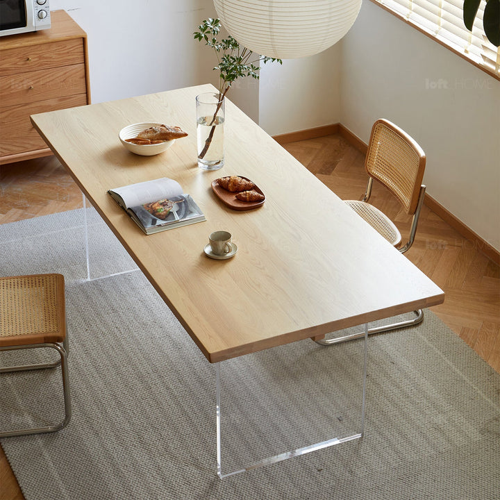 Scandinavian wood dining table float with context.