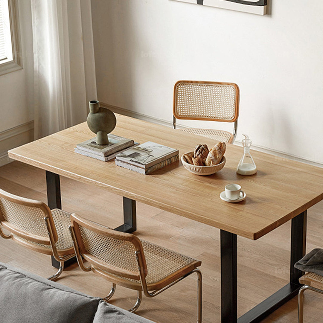 Scandinavian wood dining table sage in details.
