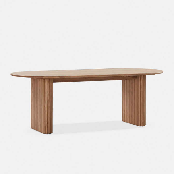 Scandinavian wood dining table tambo in close up details.