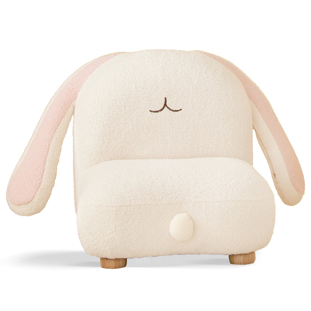 Scandinavian wood kids 1 seater sofa bunny in white background.