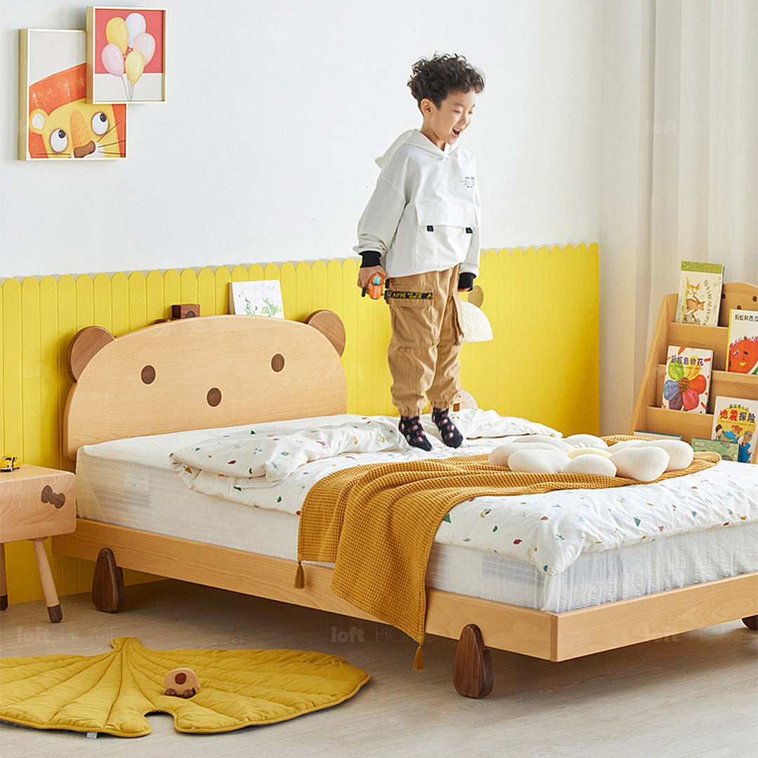 Scandinavian wood kids bed bear in still life.