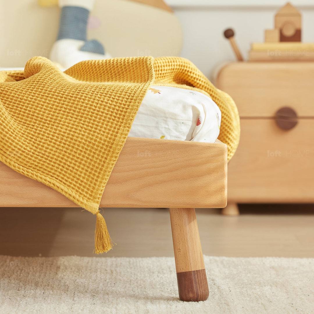 Scandinavian wood kids bed cozynut color swatches.