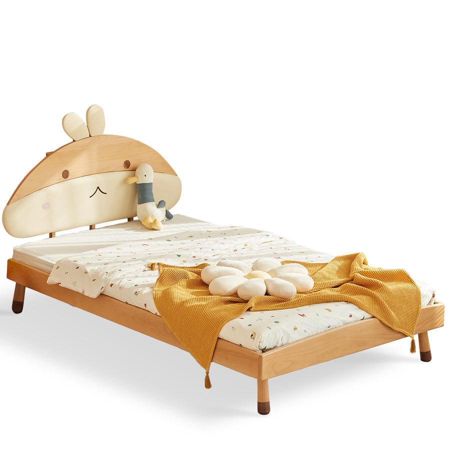 Scandinavian wood kids bed cozynut in white background.