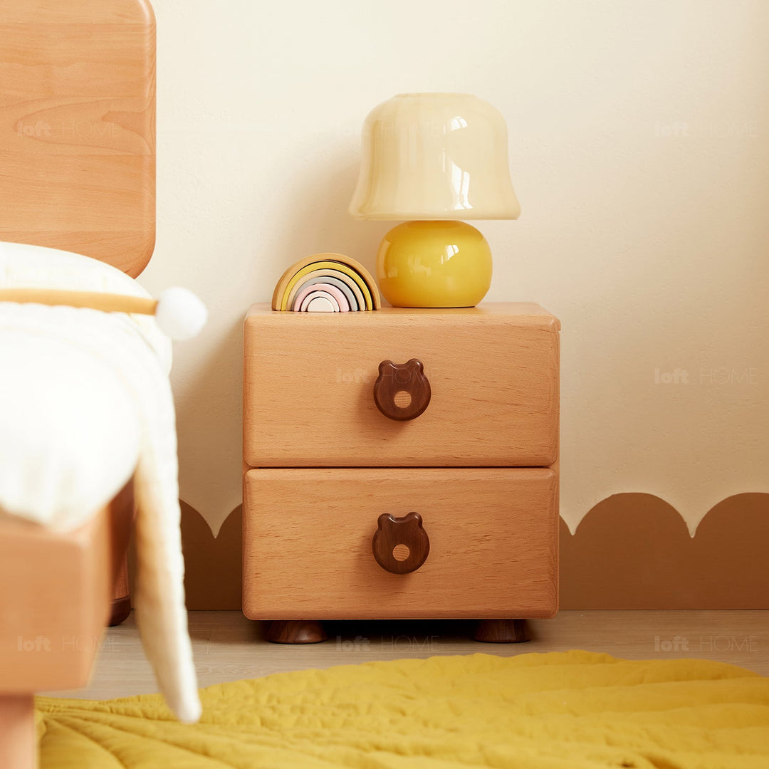Scandinavian wood kids side table teddy with context.