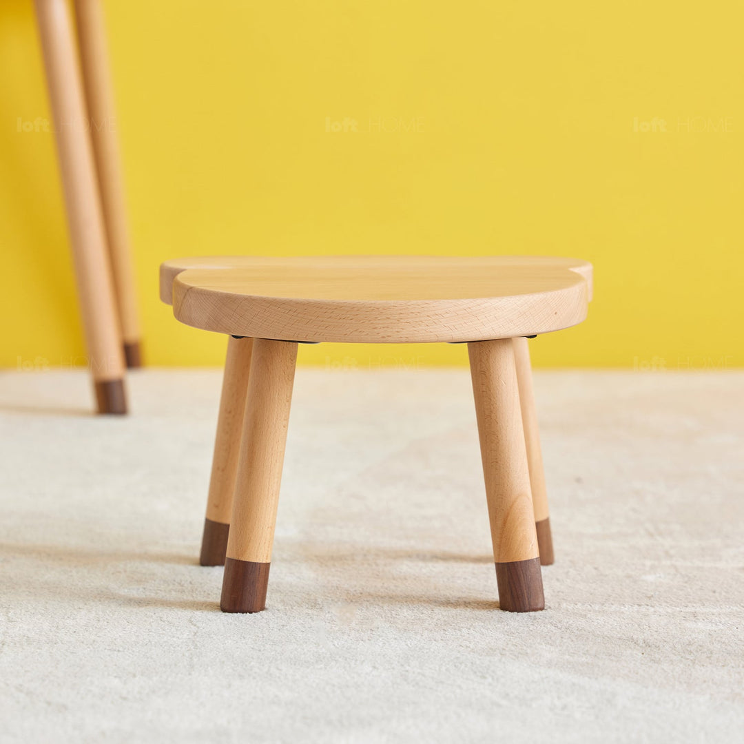 Scandinavian wood kids stool bear with context.