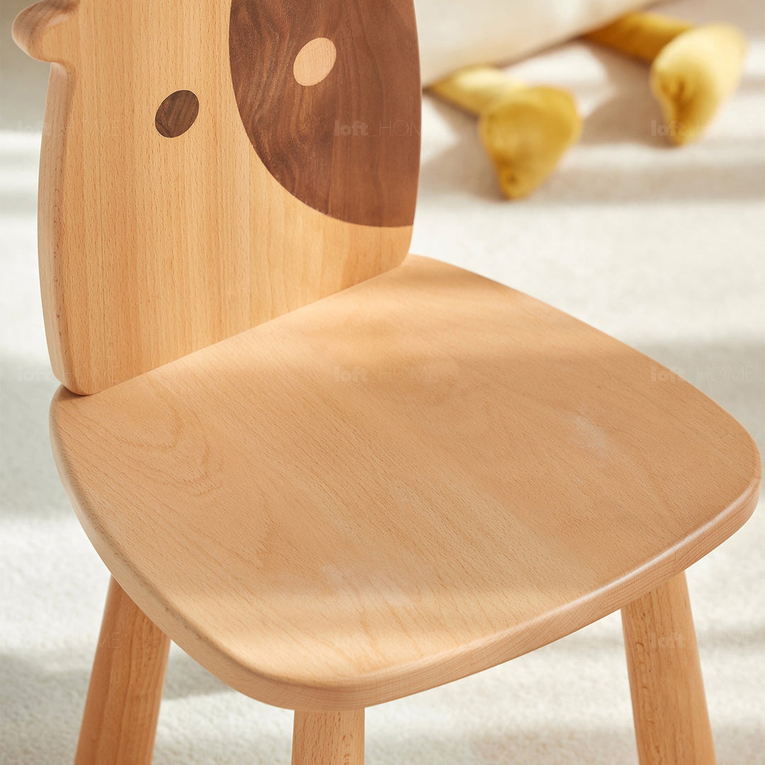 Scandinavian wood kids study chair momo with context.