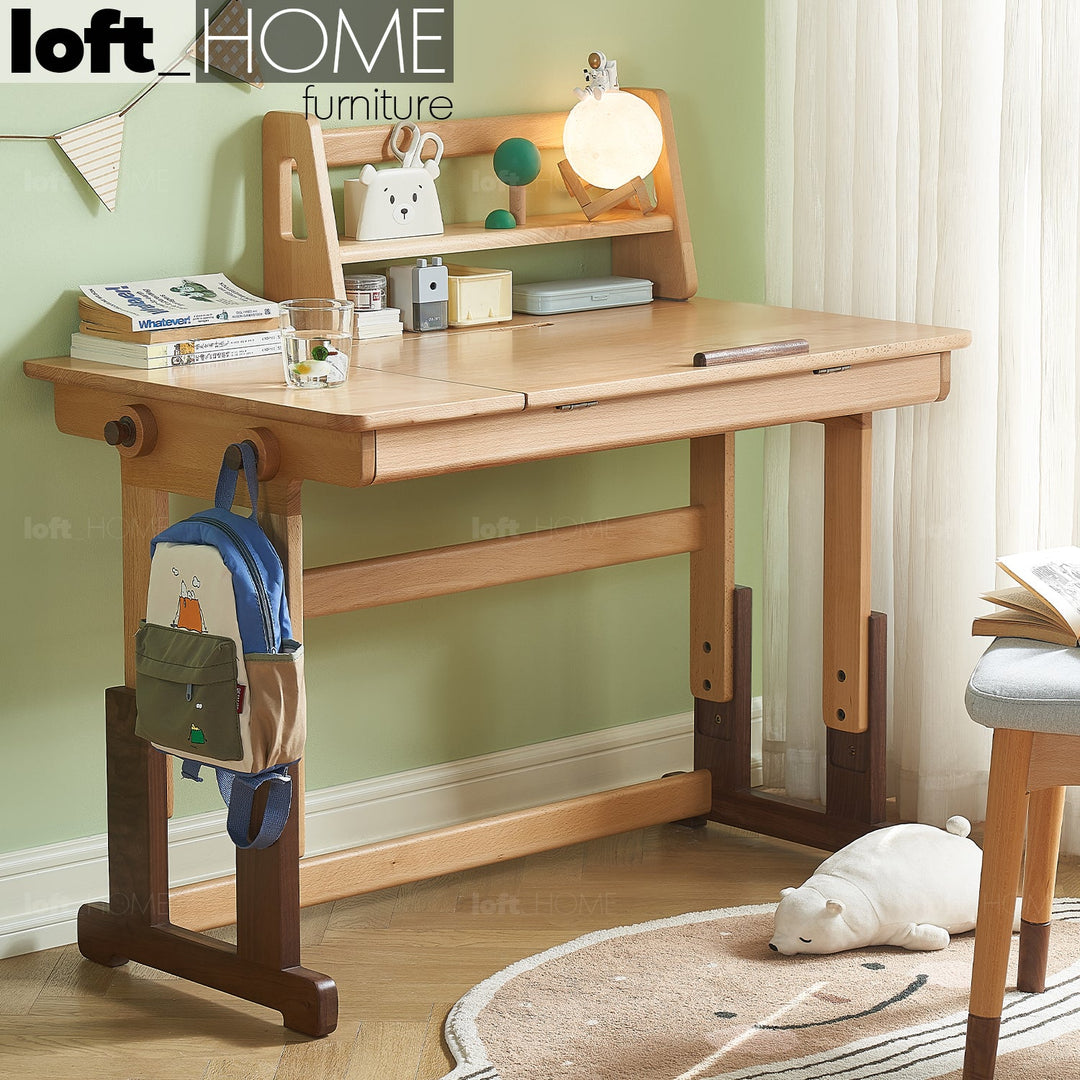 Scandinavian wood kids study table lift primary product view.
