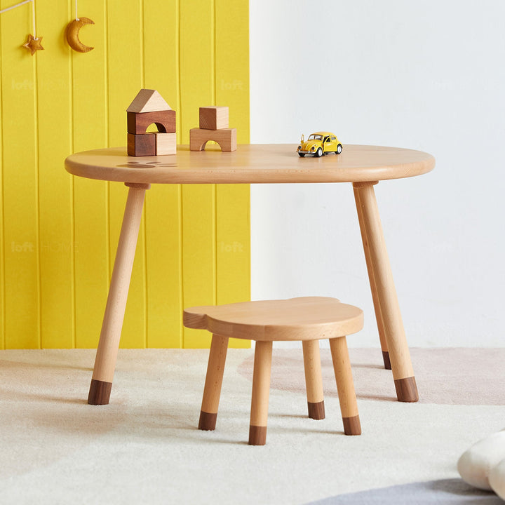 Scandinavian wood oval kids table bear color swatches.