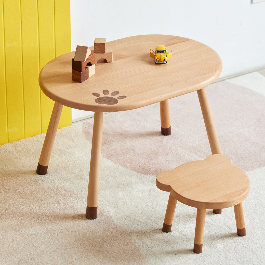 Scandinavian wood oval kids table bear in real life style.