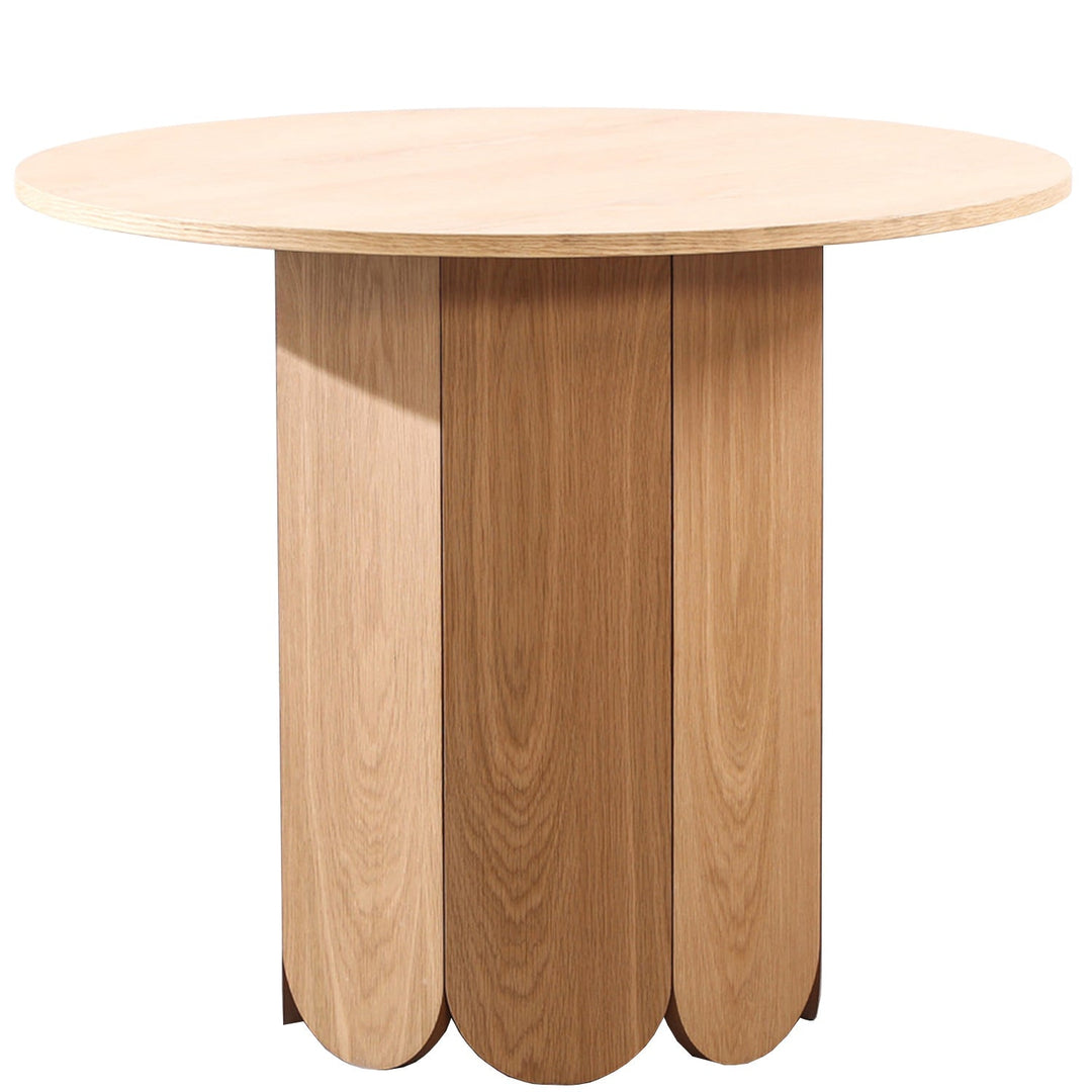 Scandinavian wood round dining table elenor in white background.