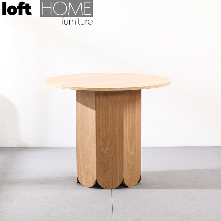 Scandinavian wood round dining table elenor primary product view.