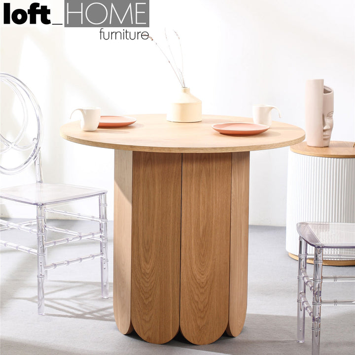 Scandinavian wood round dining table elenor material variants.