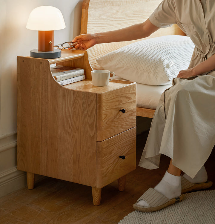 Scandinavian wood side table beside with context.