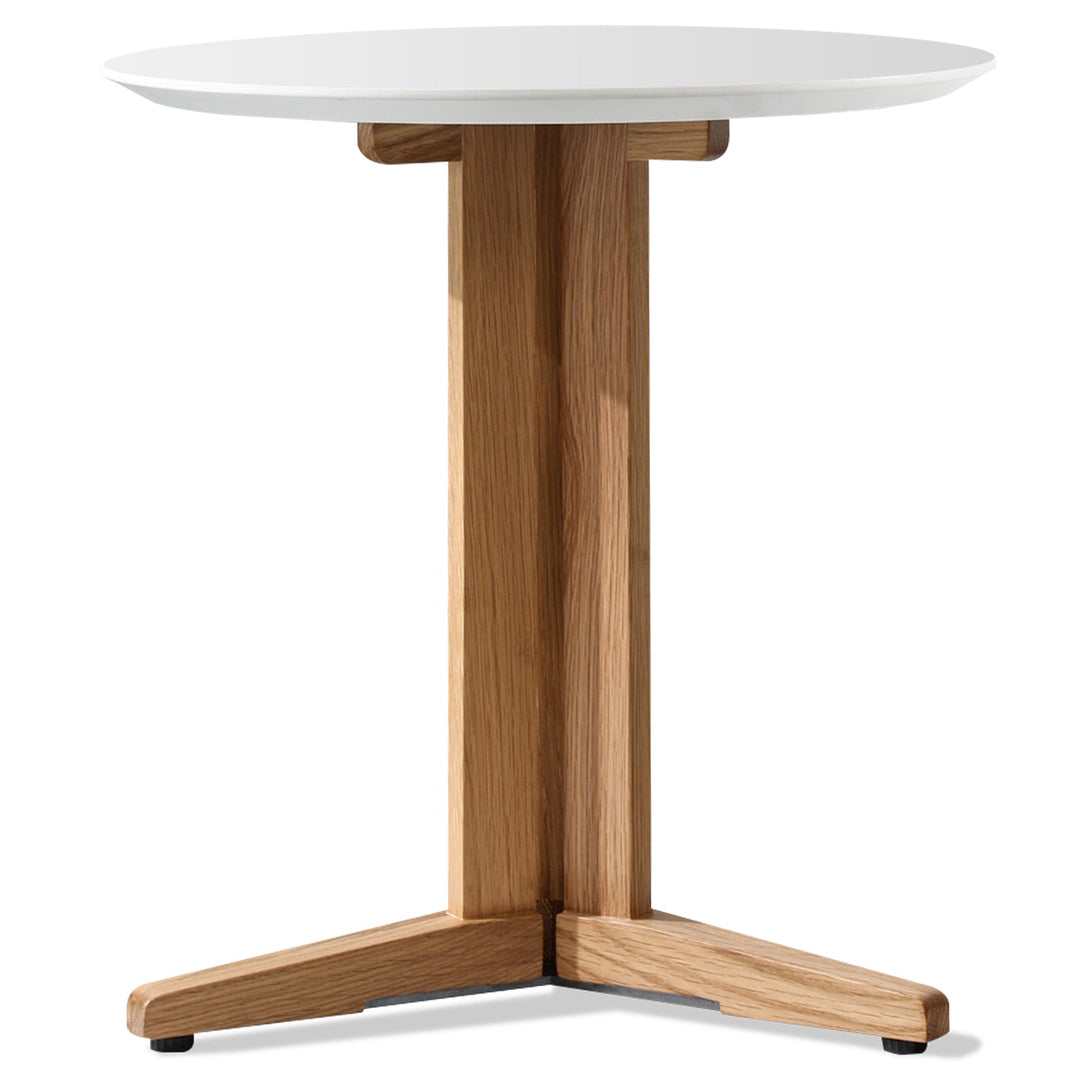 Scandinavian wood side table nick in white background.