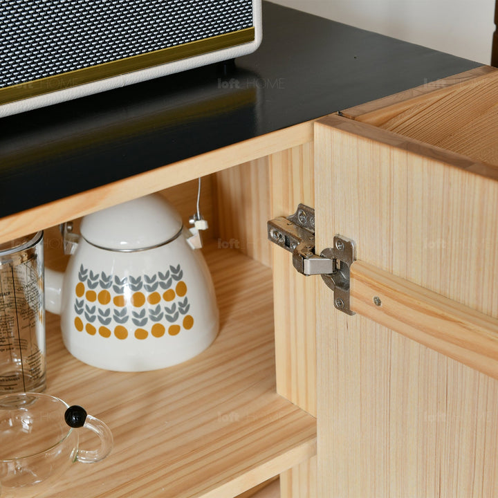 Scandinavian wood storage cabinet chevron in details.