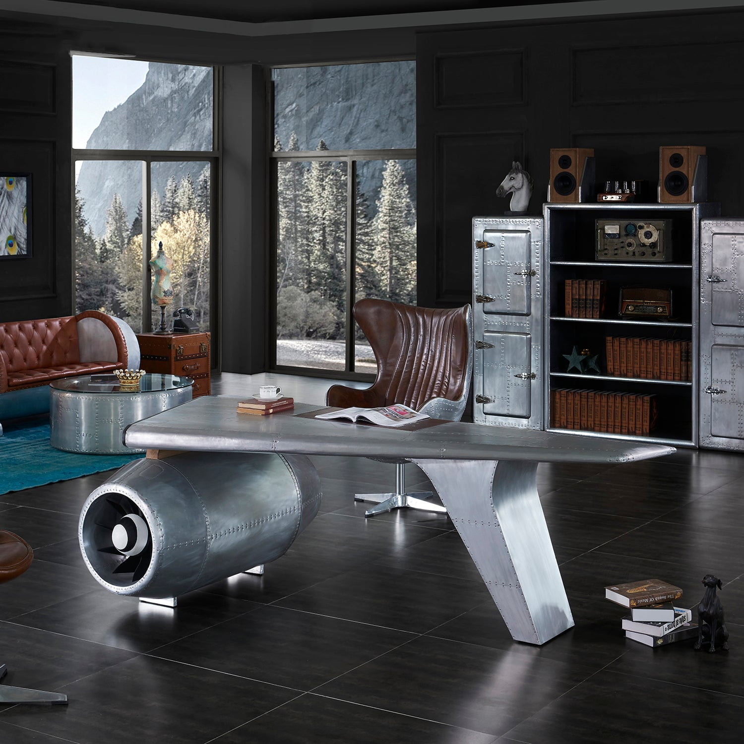 Industrial-themed office with airplane-inspired desk, leather chairs, metal bookshelves, and panoramic windows, creating a sleek and modern workspace.