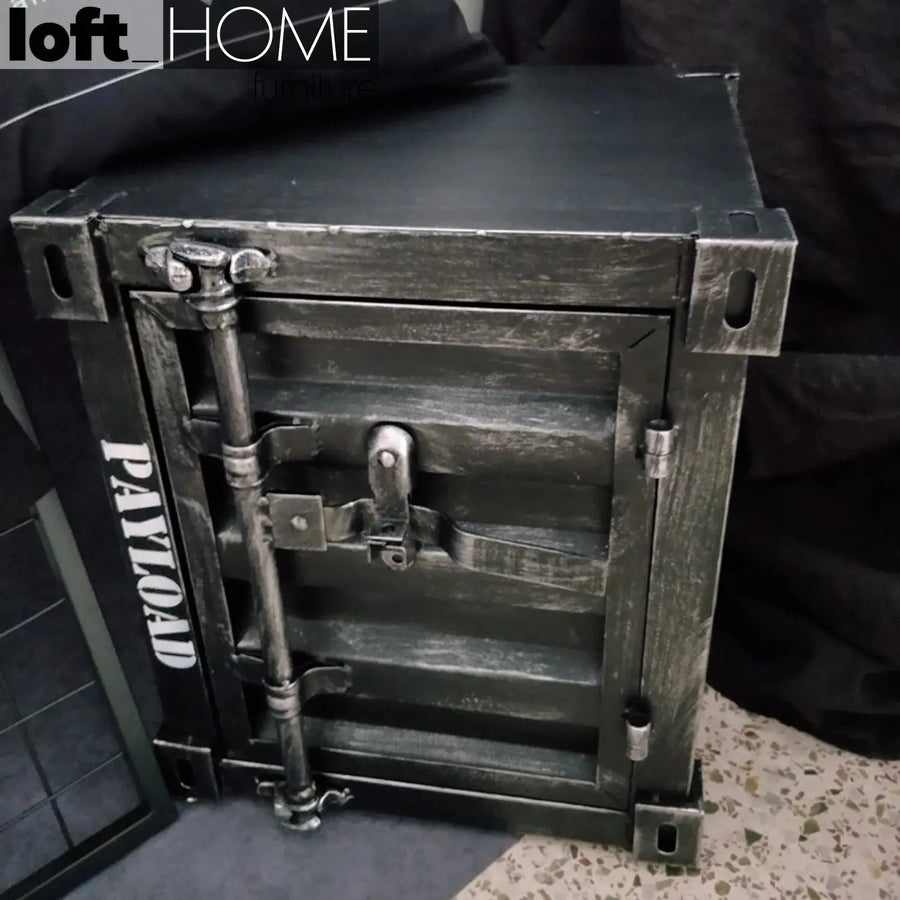 Industrial steel side table container layered structure.