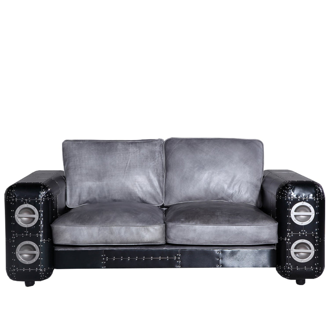 Vintage aluminium leather 2 seater sofa black aircraft in white background.