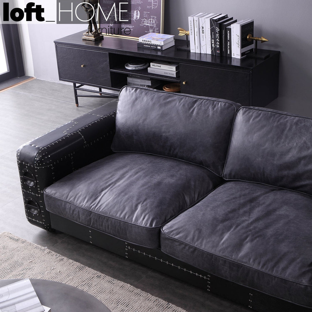 Vintage aluminium leather 2 seater sofa black aircraft in real life style.