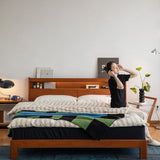Vintage boxwood bed accompany light with context.