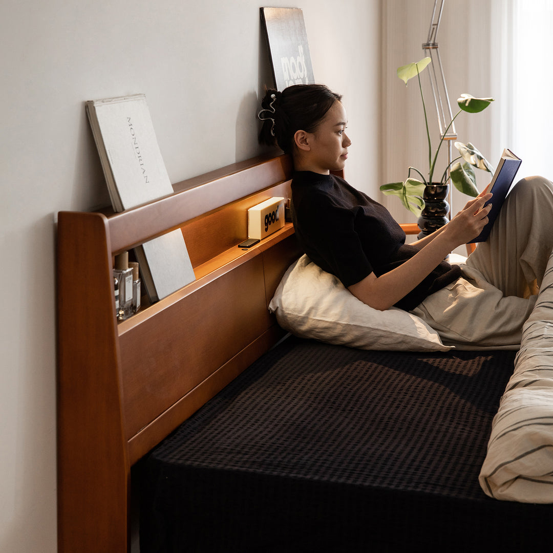 Vintage boxwood bed accompany light in details.