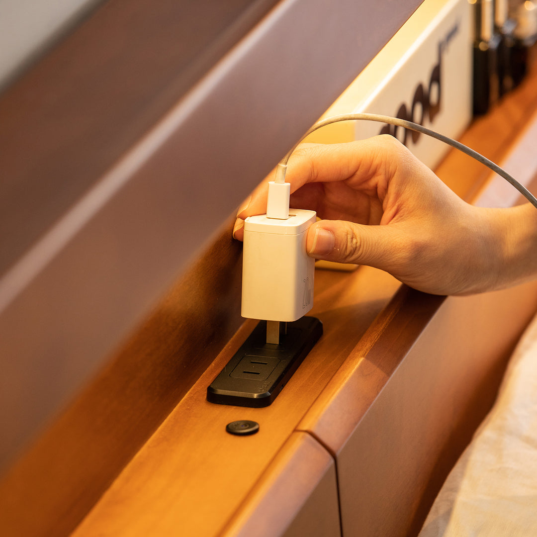 Vintage boxwood bed accompany light in panoramic view.