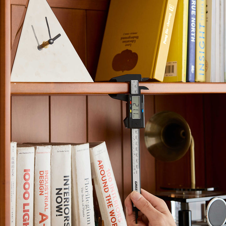 Vintage boxwood bookshelf vista in details.