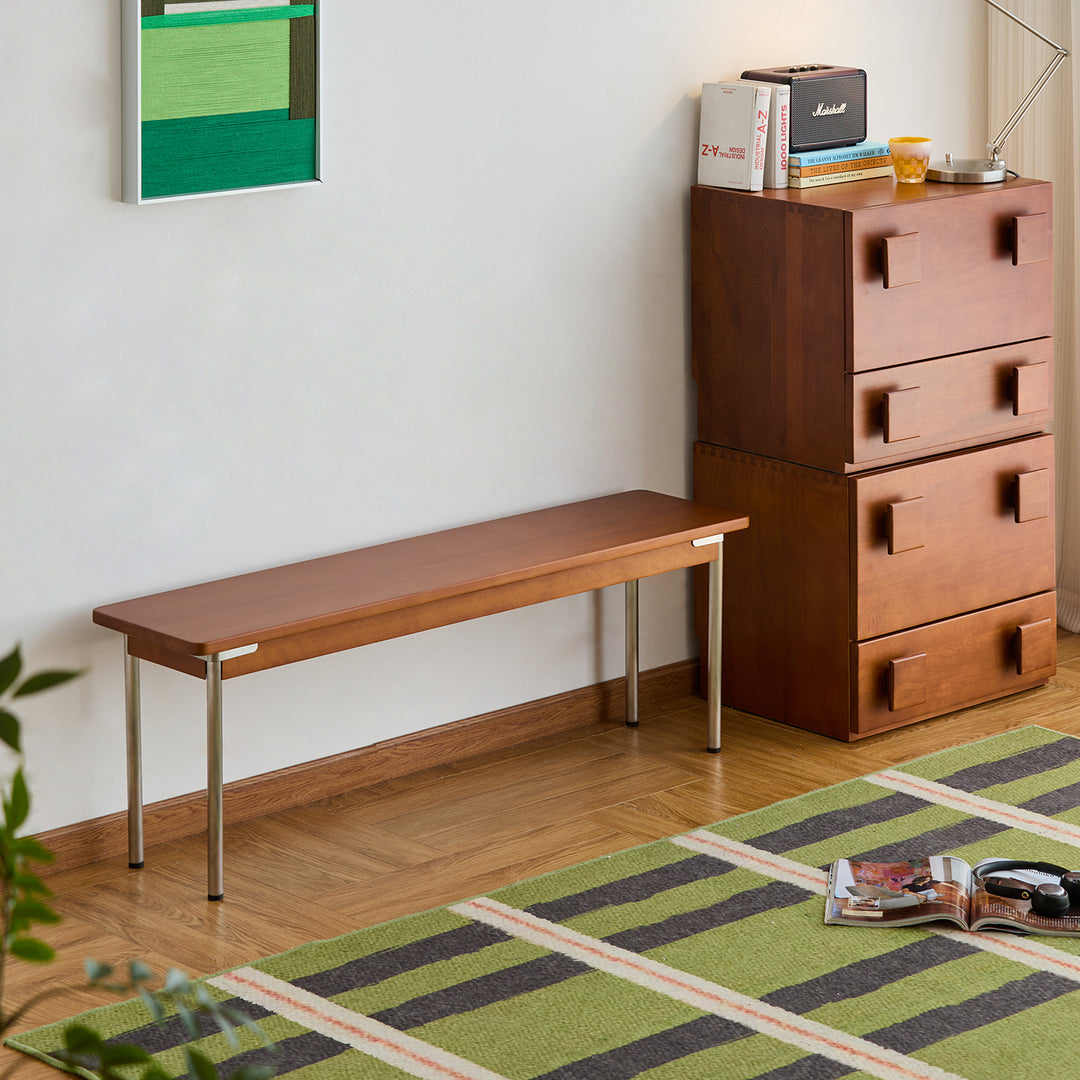 Vintage boxwood dining bench pinecone in close up details.