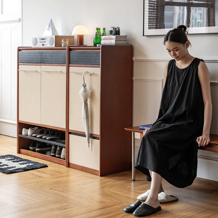 Vintage boxwood modular shoe cabinet mies in close up details.