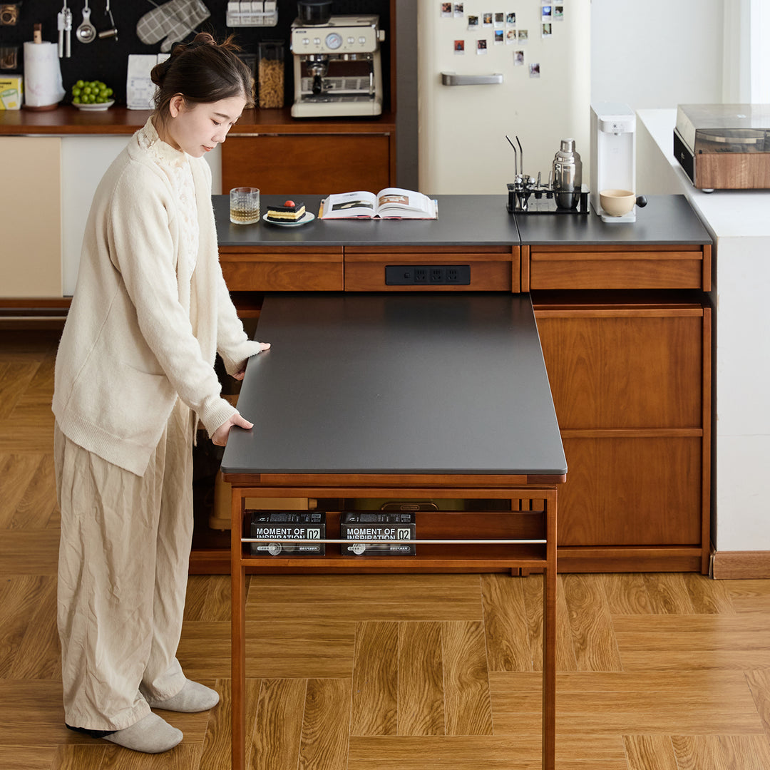 Vintage boxwood sintered stone extendable island dining table with cabinet skeletal in panoramic view.