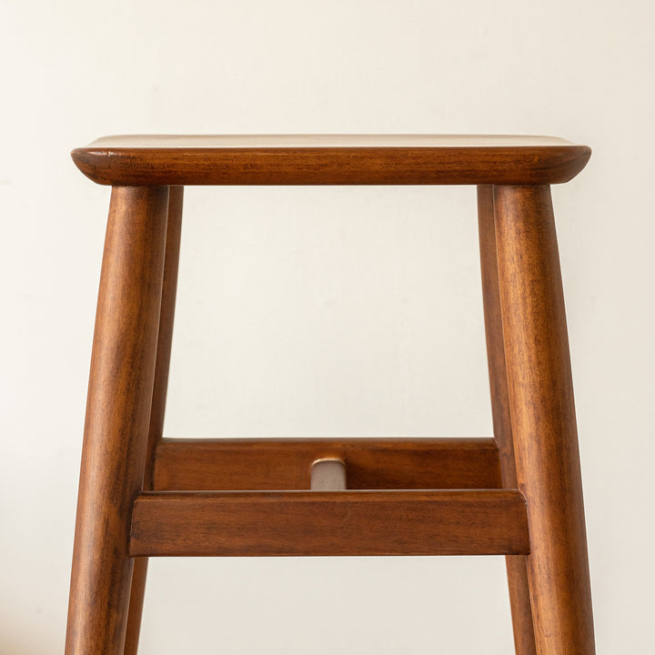 Vintage boxwood stool mellow in real life style.