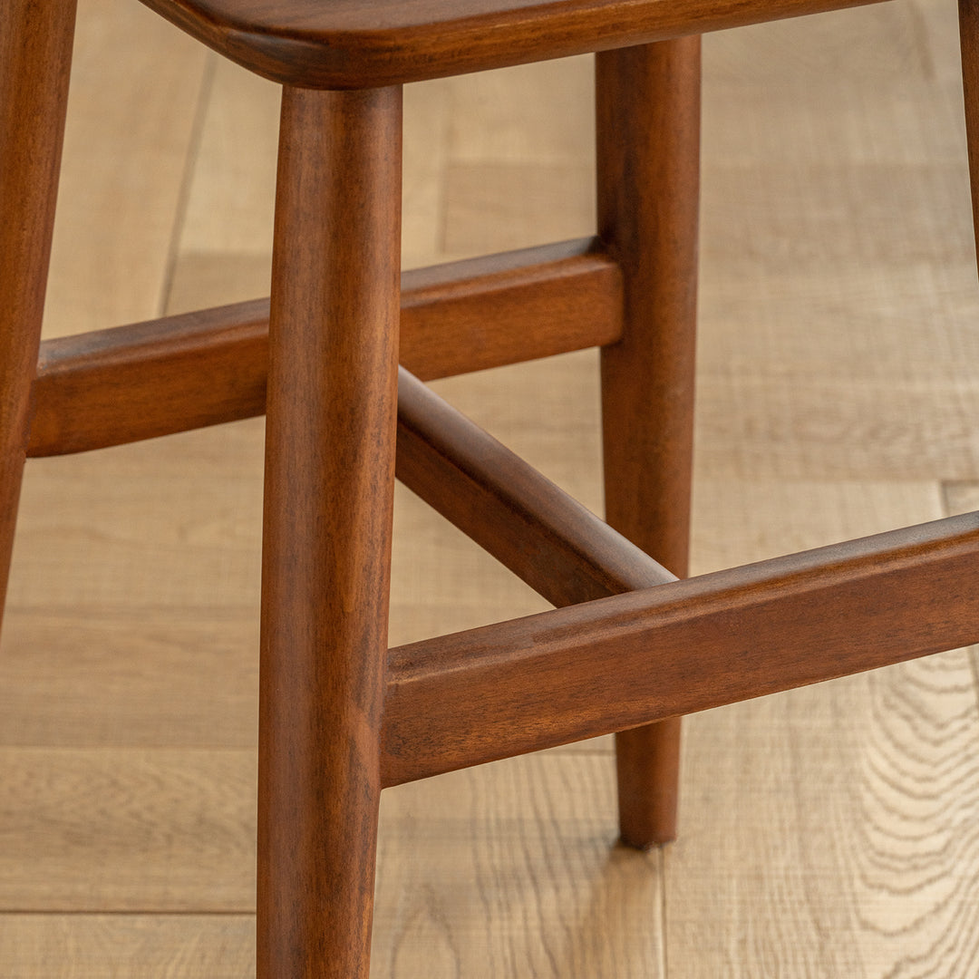 Vintage boxwood stool mellow in details.