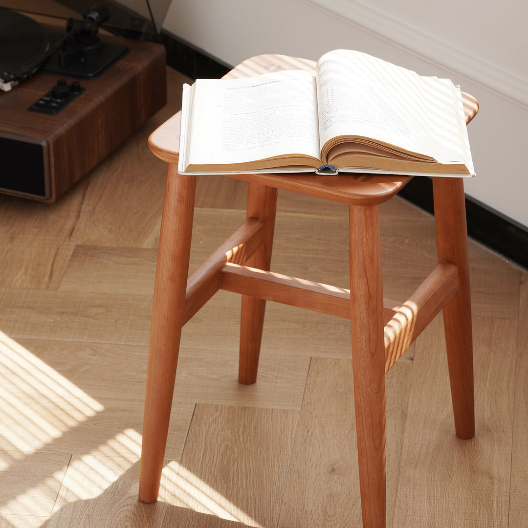 Vintage boxwood stool mellow in close up details.