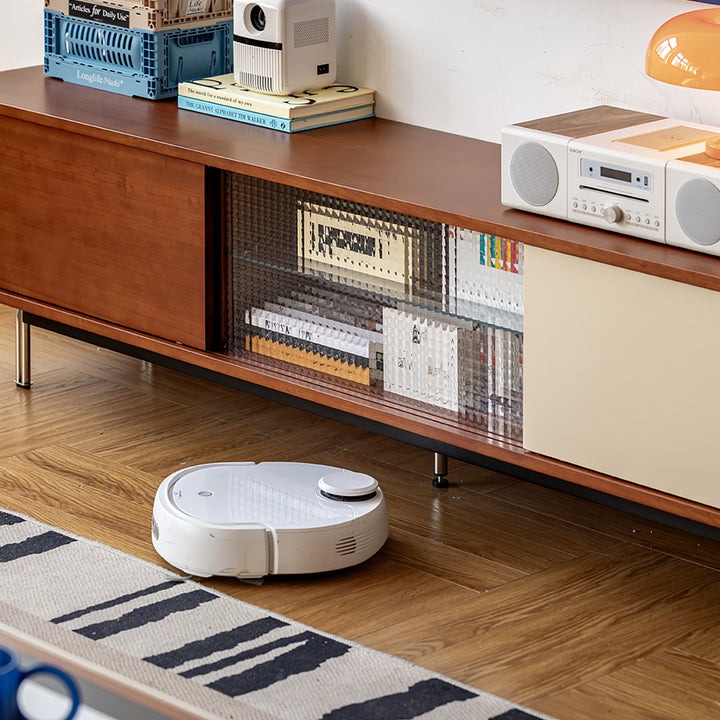 Vintage boxwood tv console pinecone in panoramic view.