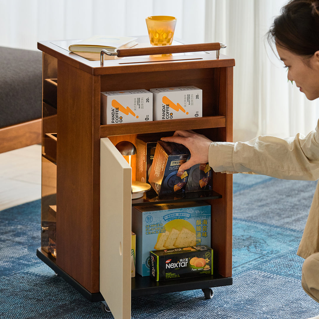 Vintage boxwood wheeled trolley side table moonrise in panoramic view.
