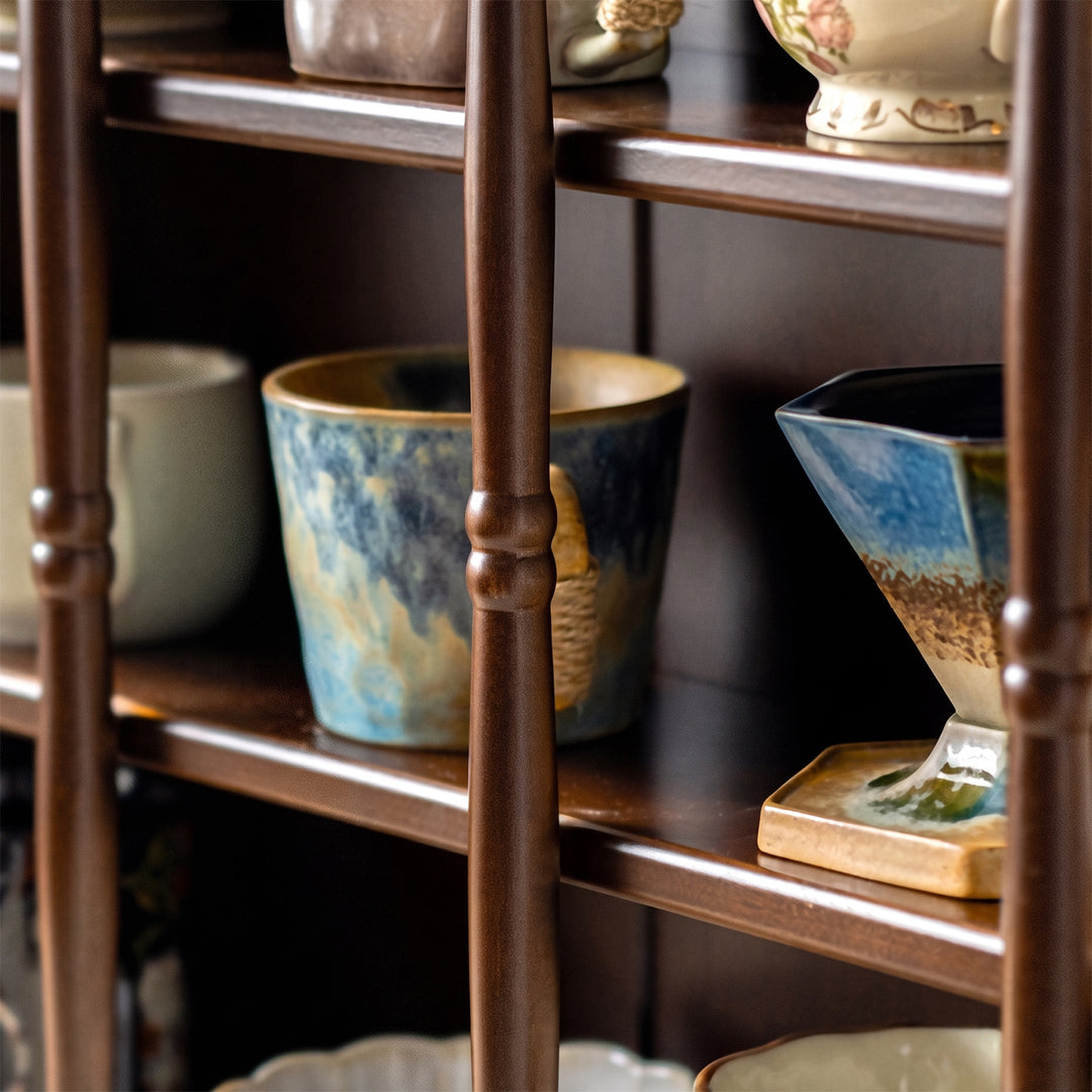 Vintage boxwood wood cup shelf vera in still life.