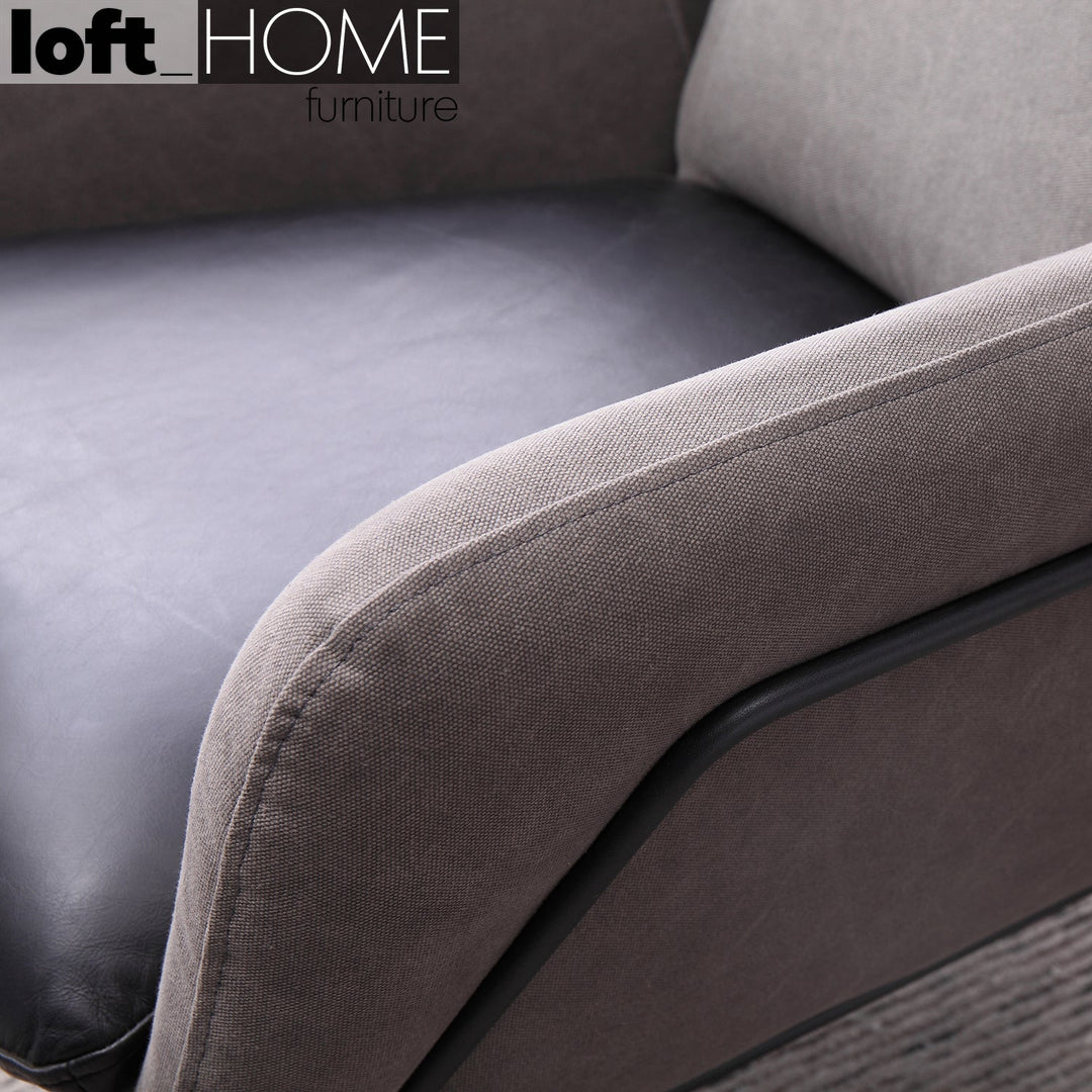 Vintage canvas and genuine leather 1 seater sofa cale in close up details.