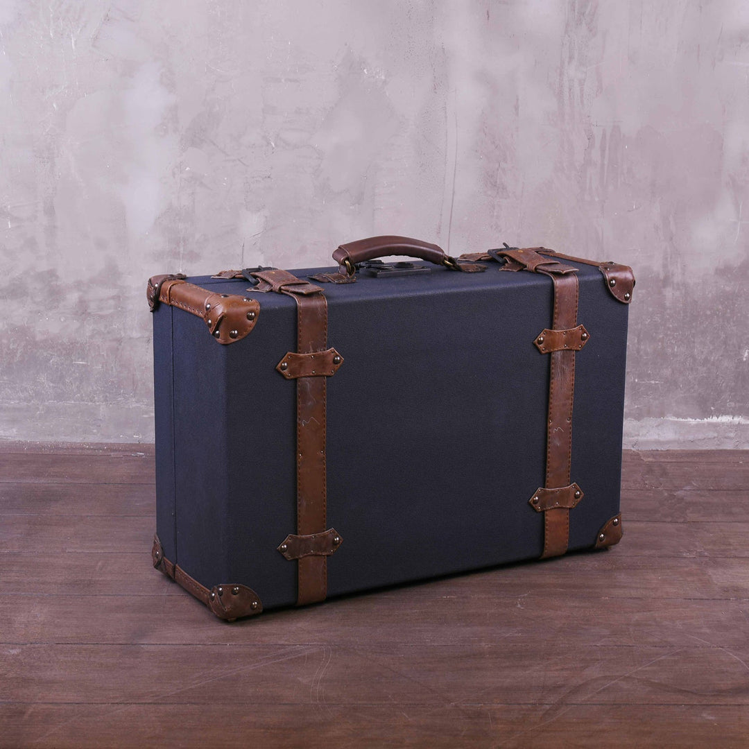 Vintage canvas and genuine leather side table suitcase trunk 1920s in details.